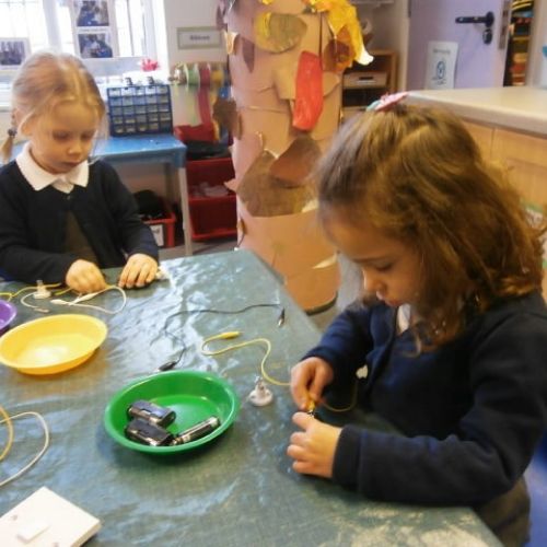 Nursery discovering how to make a bulb light up!
